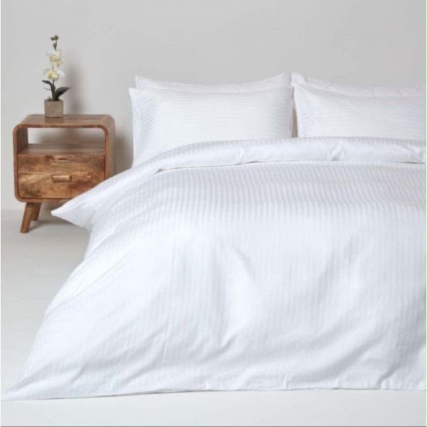 Hotel-style white bedding with striped sateen
