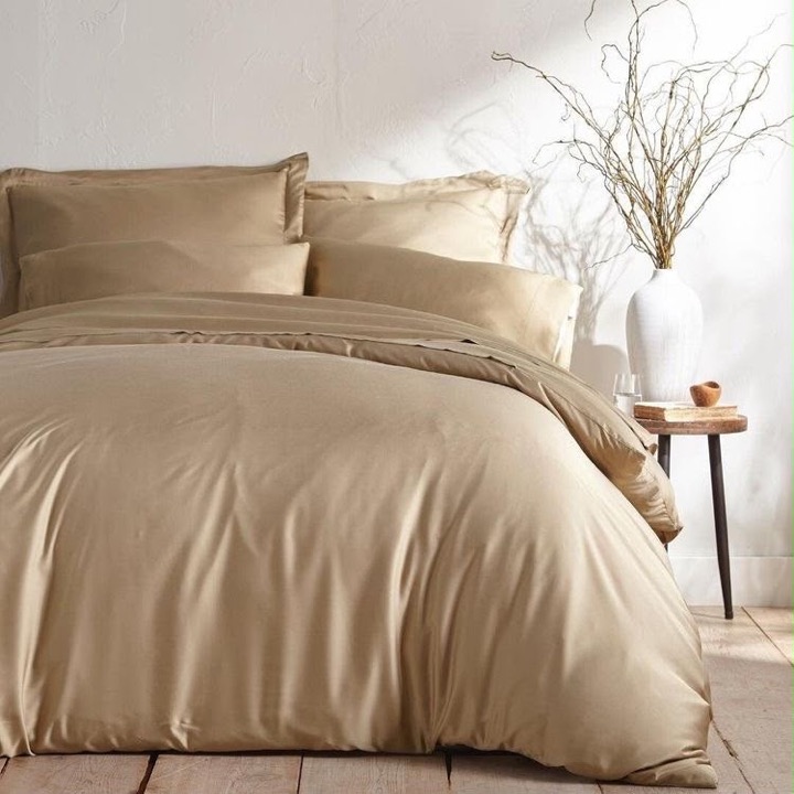 Warm sand bedding set with layered pillows