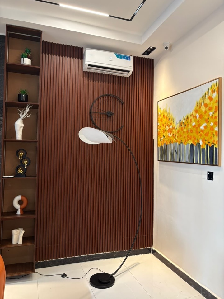 Walnut display shelving with curated objects